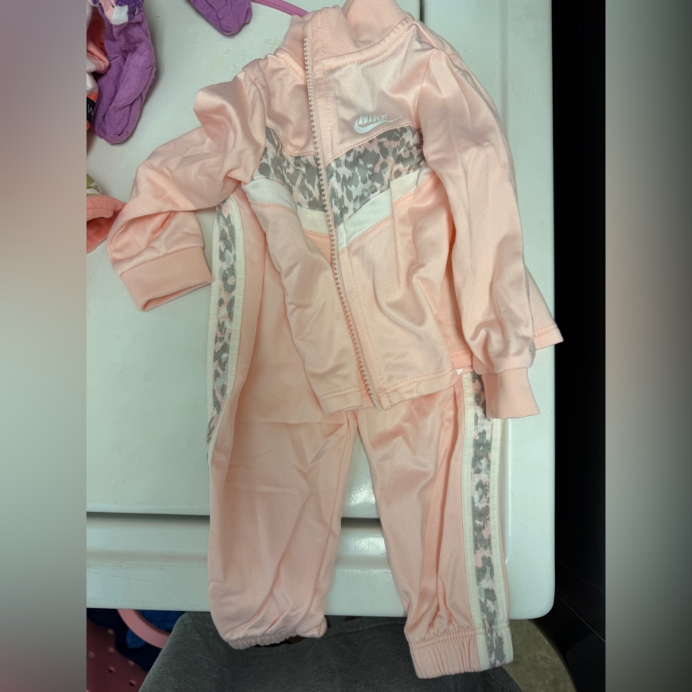 Nike Pink and cheetah track suit